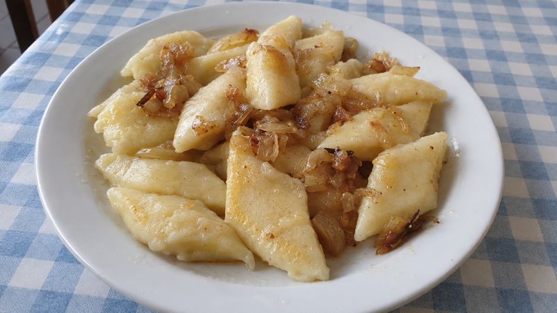 Kopytka served in a Polish milk bar