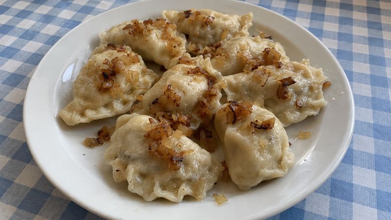 Pierogi z kapustą i grzybami served in a Polish milk bar